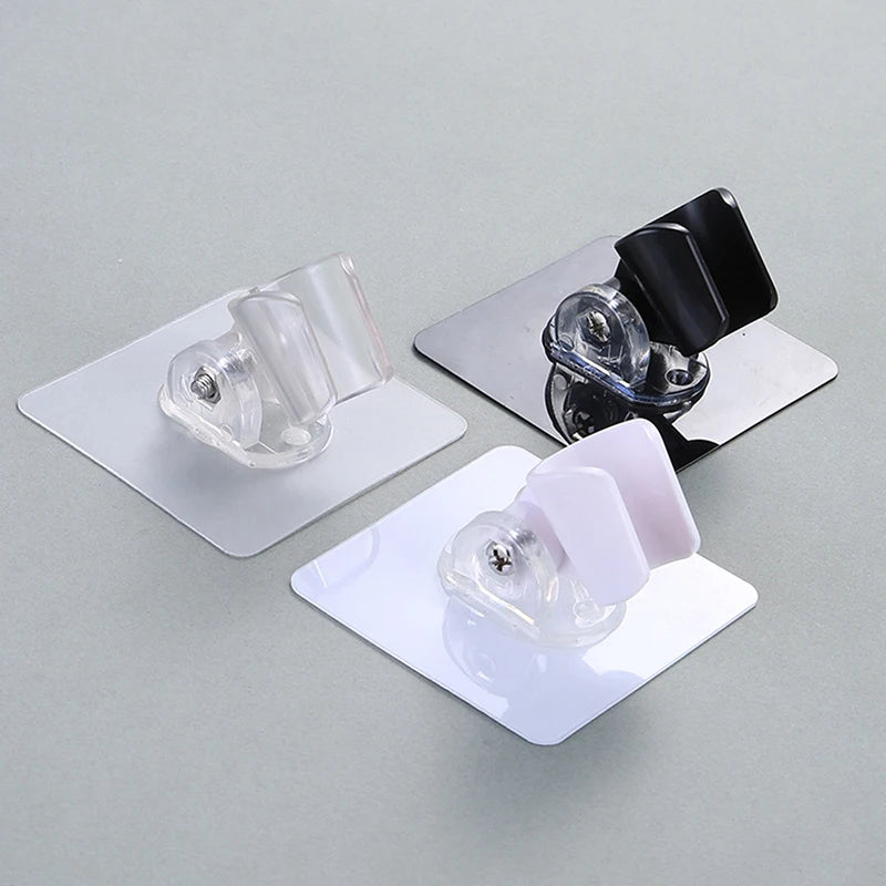 Soporte ajustable para cabezal de ducha autoadhesivoCabezales de ducha