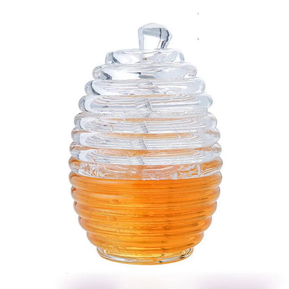 Kitchen honey storage jar with lid and glass spoon