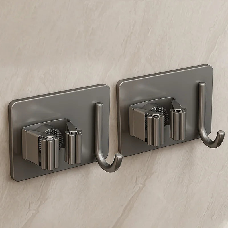 Soporte de acero inoxidable para mopas montado en paredSoportesHome & Garden > Household Supplies > Storage & Organization > Storage Hooks & Racks