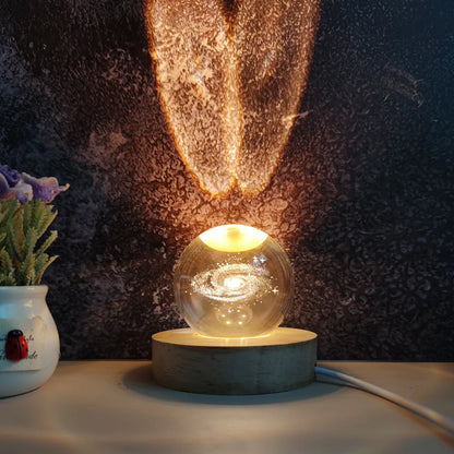 Bola de cristal de navidad y lámpara LED brillante 3D