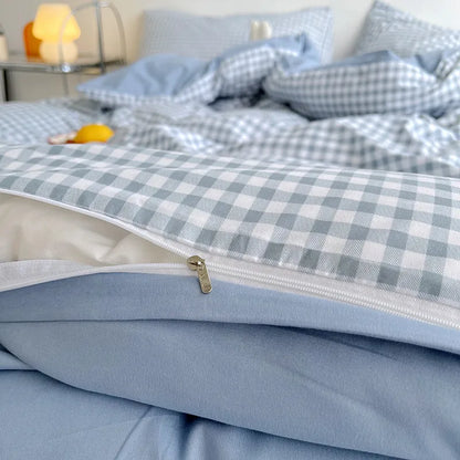 Fundas de almohada de rayas y cuadrados