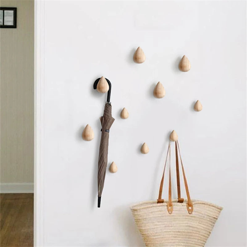 Colgador con forma de gota de madera de haya para pared decorativoColgadores