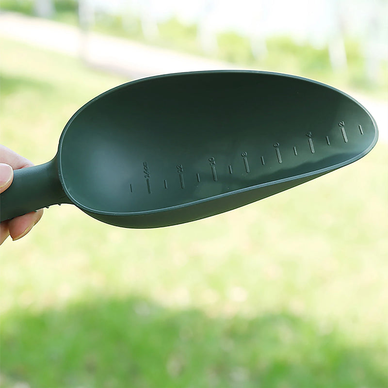 Pala de plástico con medidor para jardínAccesorios de jardinería