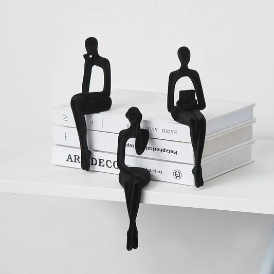 Set of resin figures in the shape of human silhouettes