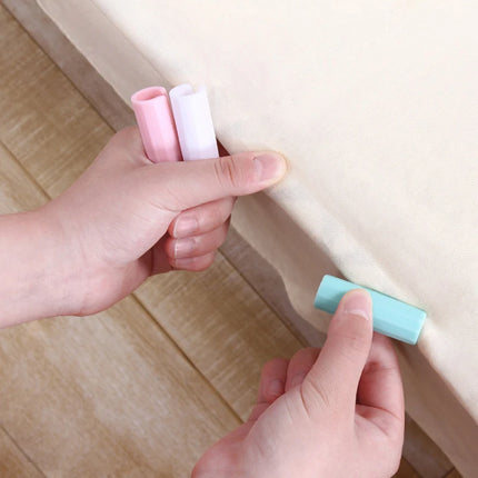 Non-slip plastic bed sheet clips