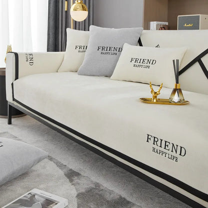 Cubiertas individuales para sofá con bordado Friend en colores neutros