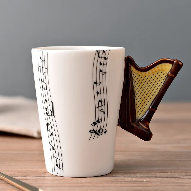 Taza de Cerámica 250ml con Notas Musicales y Asa en Forma de InstrumentoTazasHome & Garden > Kitchen & Dining > Tableware > Drinkware > Coffee & Tea Cups