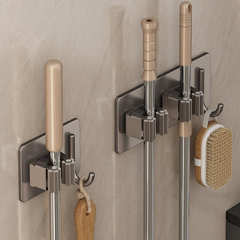 Soporte de acero inoxidable para mopas montado en paredSoportesHome & Garden > Household Supplies > Storage & Organization > Storage Hooks & Racks
