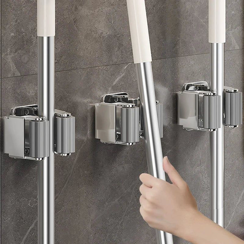 Gancho porta escobas adhesivo de acero inoxidable · Organizador de paredColgadoresHome & Garden > Bathroom Accessories > Robe Hooks