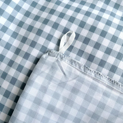 Fundas de almohada de rayas y cuadrados