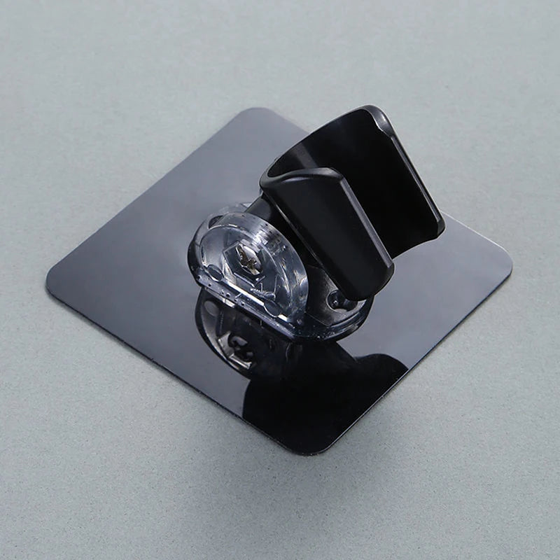 Soporte ajustable para cabezal de ducha autoadhesivoCabezales de ducha