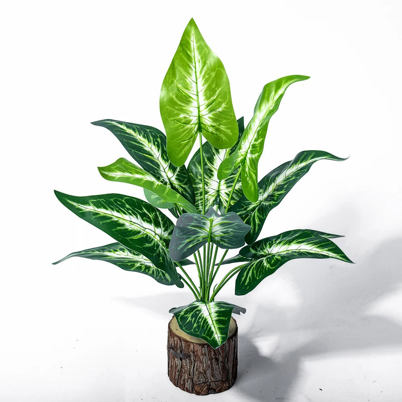 Planta artificial decorativa 43 cm | hojas tropicales realistas con base efecto troncoPlantas artificialesHome & Garden > Decor > Artificial Flora > Artificial Non-Flowering Plants