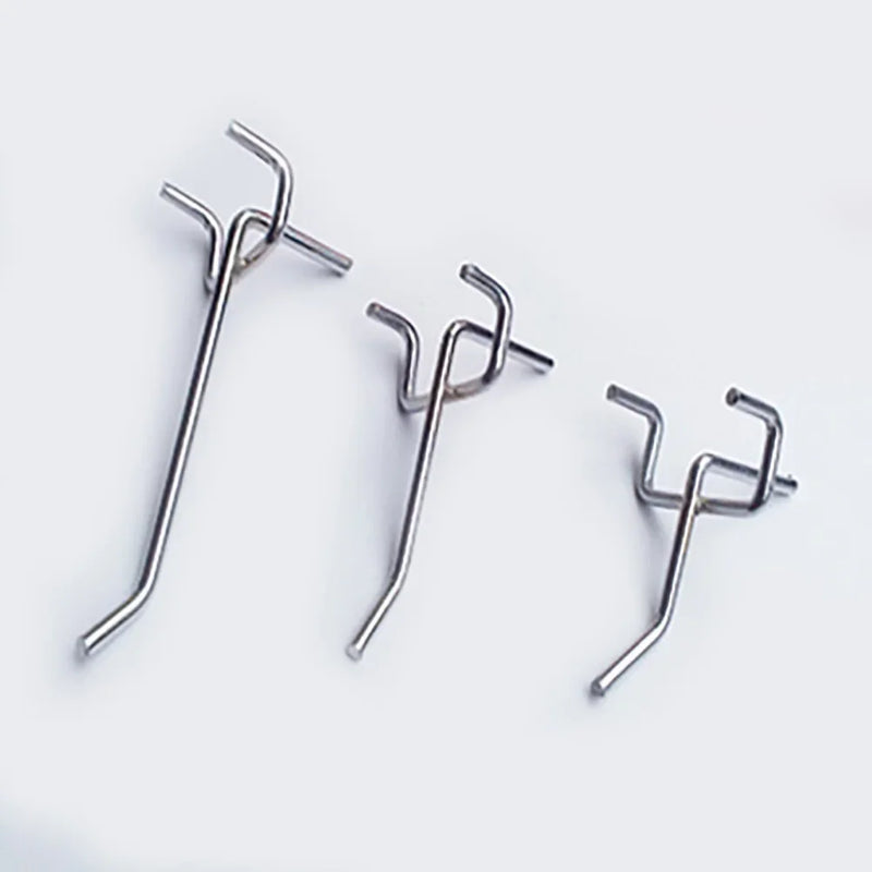Ganchos para panel perforado de acero – Pack 20 unidades, paso 3,2 cmPaneles perforadosHome & Garden > Household Supplies > Storage & Organization > Storage Hooks & Racks > Utility Hooks