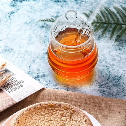 Kitchen honey storage jar with lid and glass spoon