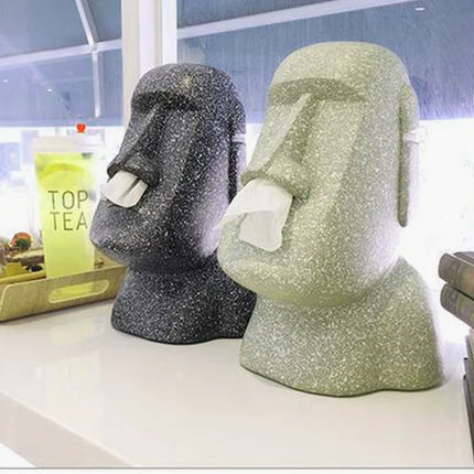 Moai shaped paper dispenser