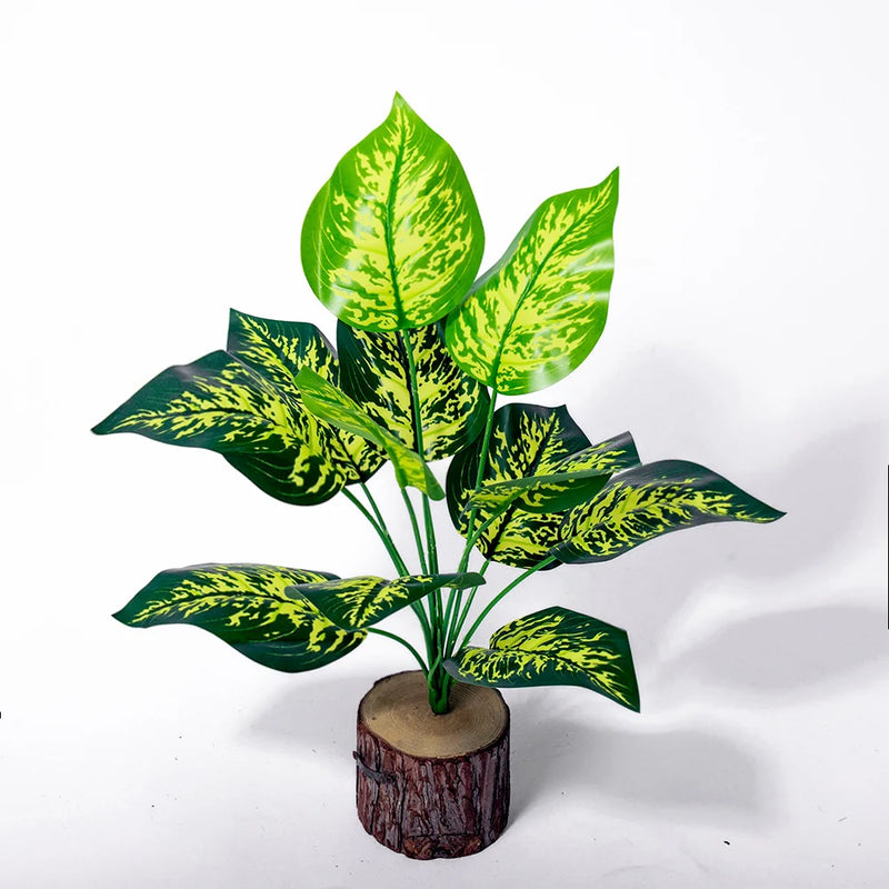 Planta artificial decorativa 43 cm | hojas tropicales realistas con base efecto troncoPlantas artificialesHome & Garden > Decor > Artificial Flora > Artificial Non-Flowering Plants