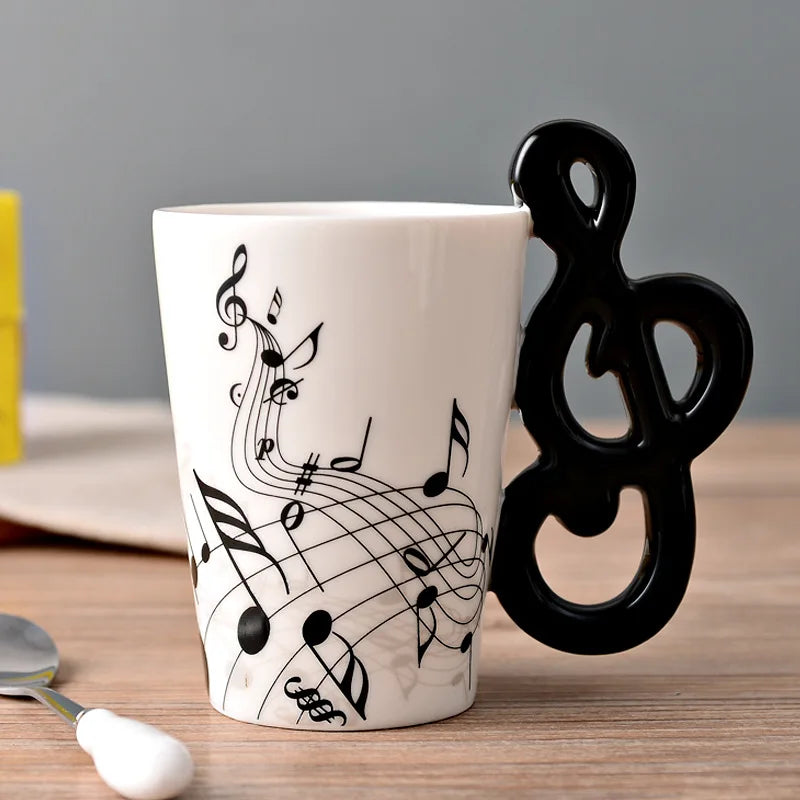 Taza de Cerámica 250ml con Notas Musicales y Asa en Forma de InstrumentoTazasHome & Garden > Kitchen & Dining > Tableware > Drinkware > Coffee & Tea Cups