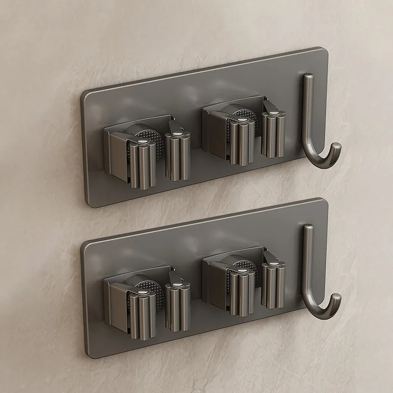 Soporte de acero inoxidable para mopas montado en paredSoportesHome & Garden > Household Supplies > Storage & Organization > Storage Hooks & Racks