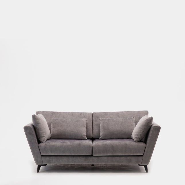 Sofá moderno con cojines de cabecera para la sala con estilo