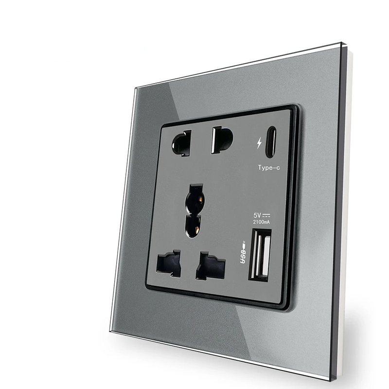 Enchufe universal con puertos USB A + C, Serie D1Enchufes