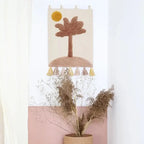 Decoração de parede infantil em forma de pequena palmeira | veludo