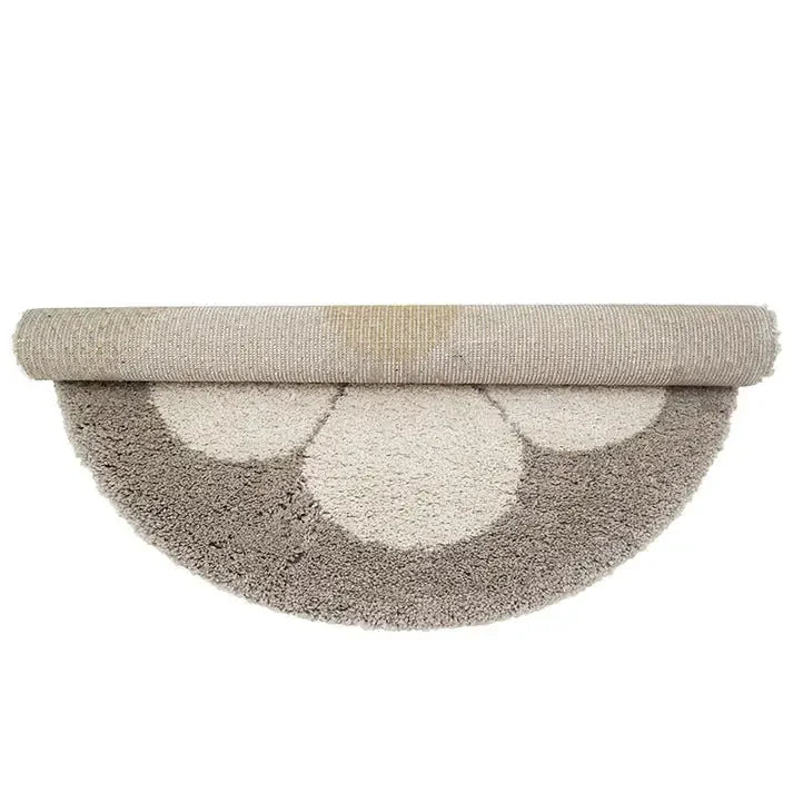 Alfombra infantil redonda con diseño Daisy en beige suave
