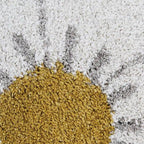 Alfombra infantil redonda con diseño Daisy en beige suave