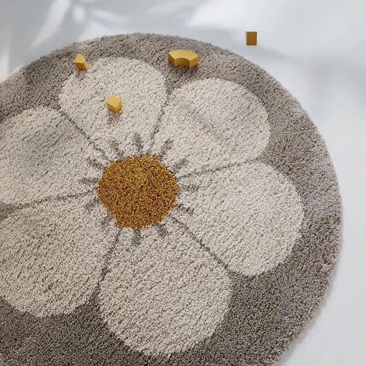 Alfombra infantil redonda con diseño Daisy en beige suave