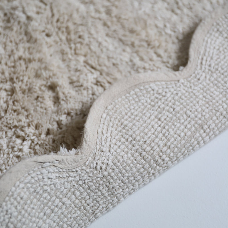 Alfombra infantil ovalada MARISA color crudo con borde en ondas 100x150cmCotonHome & Garden > Decor > Rugs