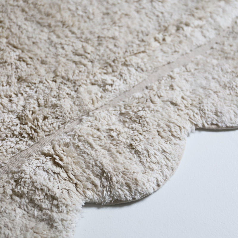 Alfombra infantil ovalada MARISA color crudo con borde en ondas 100x150cmCotonHome & Garden > Decor > Rugs