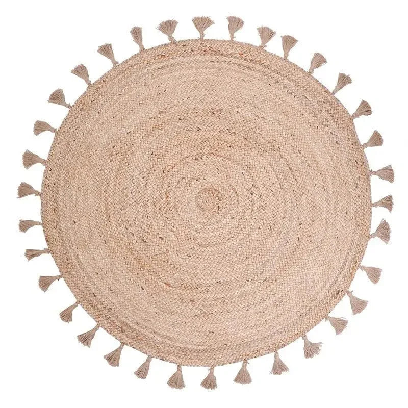 Round jute children's rug with pompoms