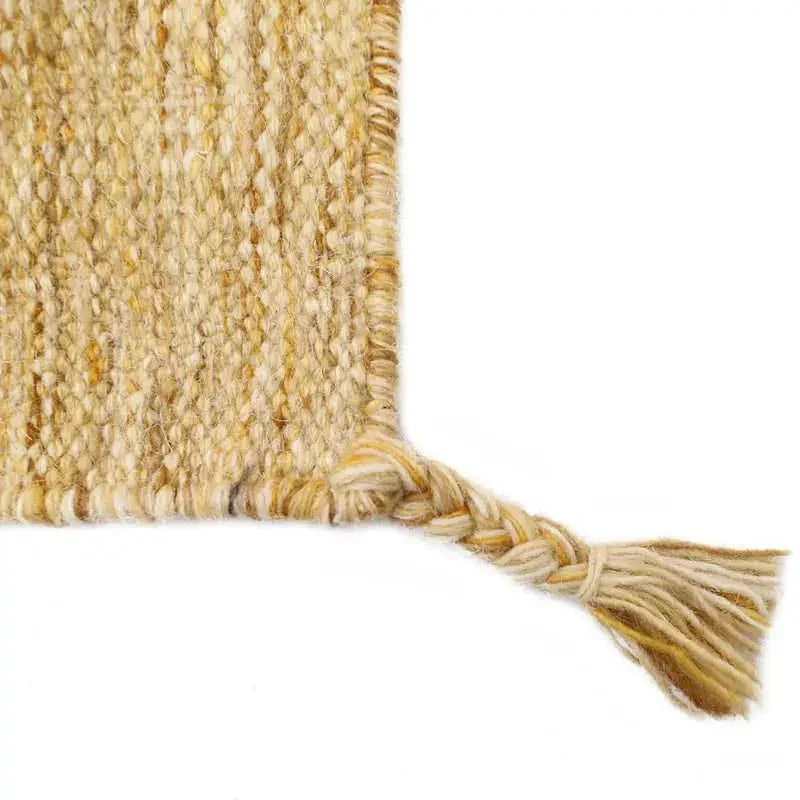 Handwoven natural wool rug with mottled colors