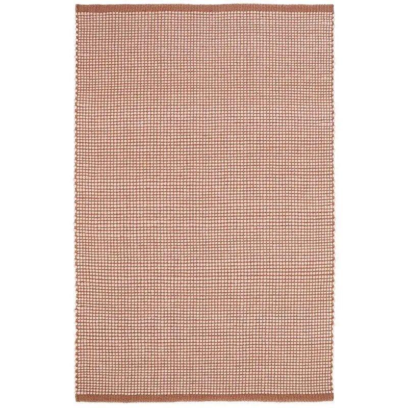 Pure wool nude XS rug with refined graphic design