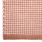 Pure wool nude XS rug with refined graphic design