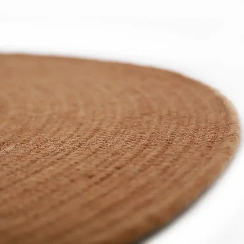 Round rug made of natural wool, handmade in India | understated design