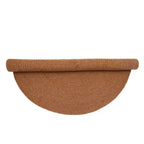 Round rug made of natural wool, handmade in India | understated design