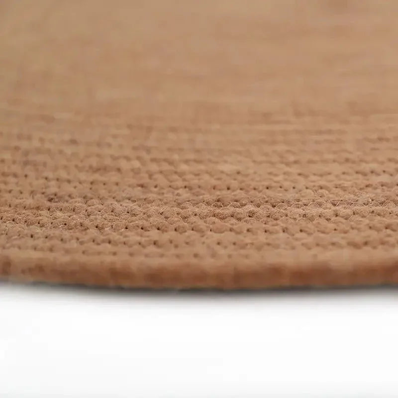 Round rug made of natural wool, handmade in India | understated design