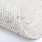 Handmade round natural wool rug for decoration