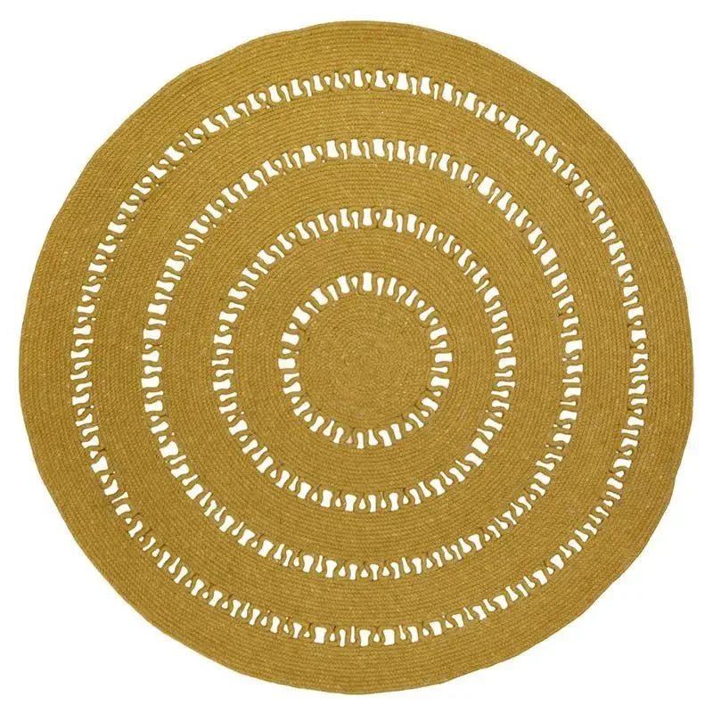 round handmade wool rug with openwork design