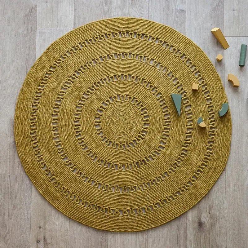 round handmade wool rug with openwork design