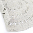 Natural round wool rug handmade in India