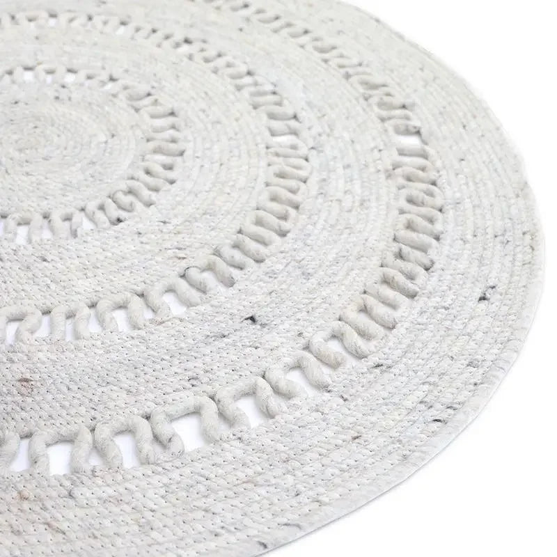 Natural round wool rug handmade in India