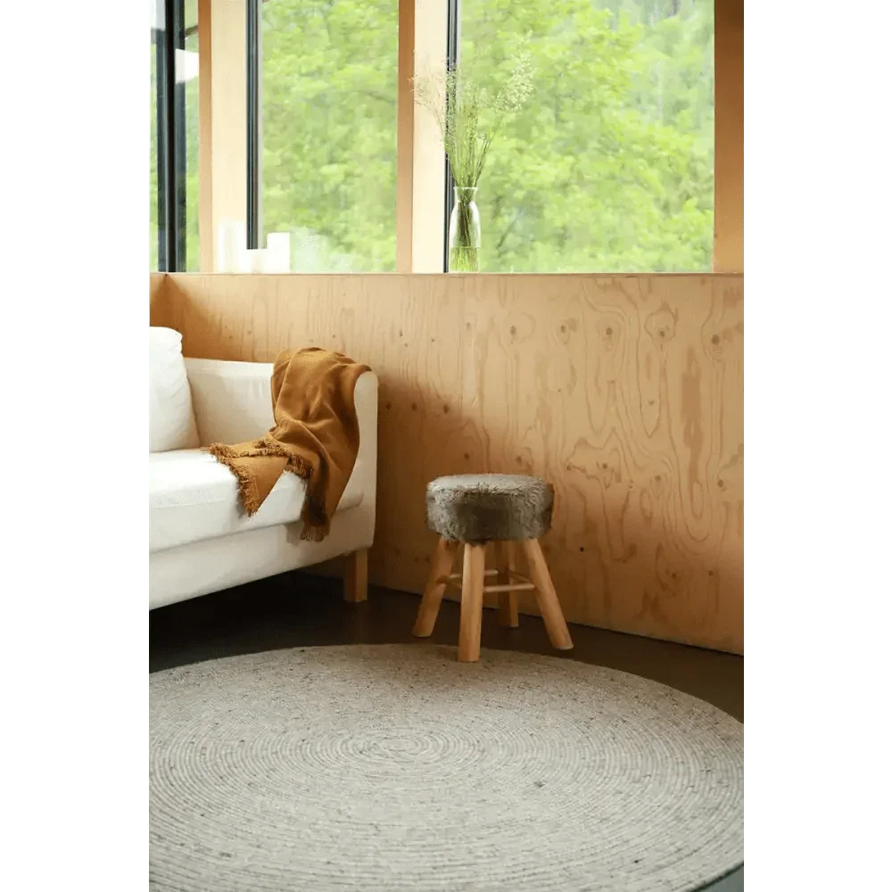 Natural grey wool round rug for indoor use