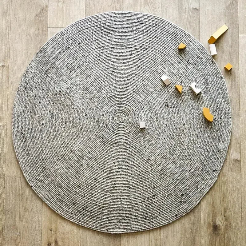 Natural grey wool round rug for indoor use
