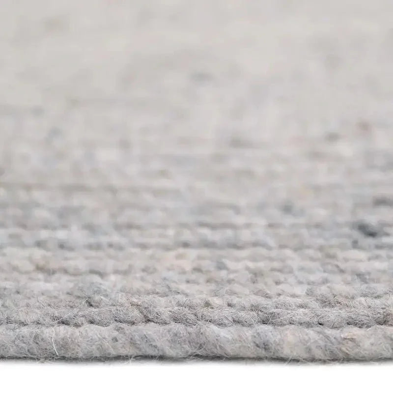Natural grey wool round rug for indoor use