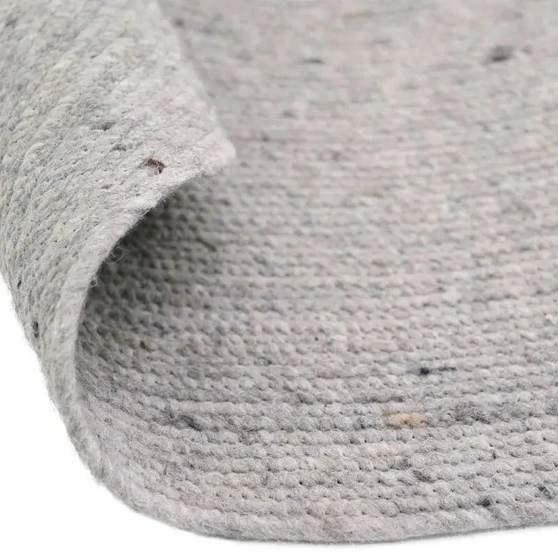 Natural grey wool round rug for indoor use