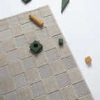 Kids' checkered rug in sand color
