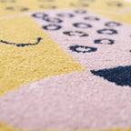 Oval children's rug with leopard design | honey