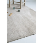 Machine washable plain cream rug
