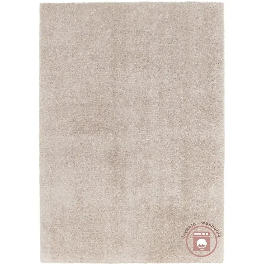 Washable cream-colored short-pile rug
